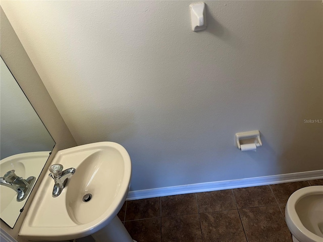 bathroom featuring sink and tile patterned floors