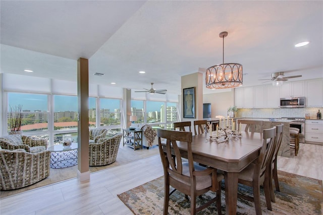 dining area with ceiling fan