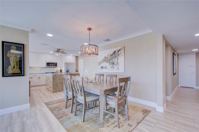 dining room featuring a notable chandelier