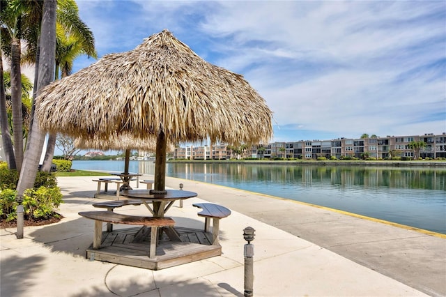 view of home's community with a gazebo and a water view