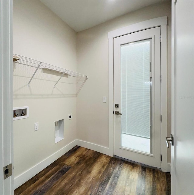 washroom featuring electric dryer hookup, dark hardwood / wood-style floors, and washer hookup