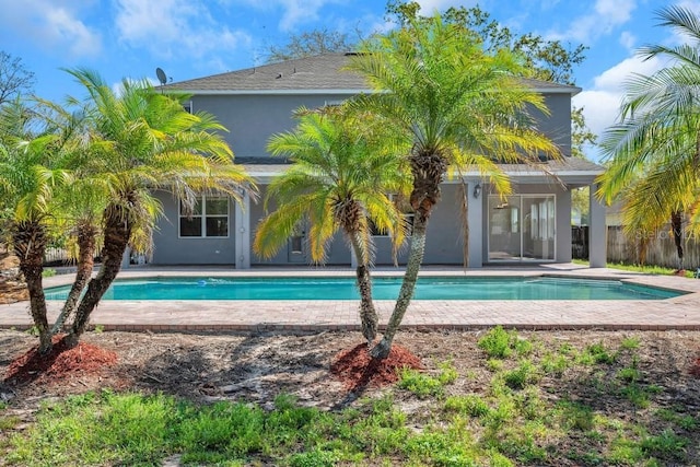 view of swimming pool featuring a patio area