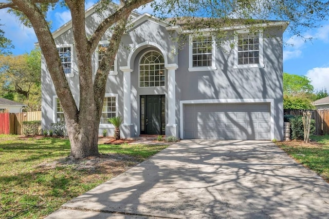 view of front of property with a garage