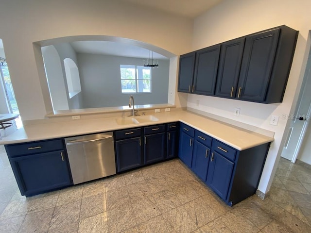 kitchen with stainless steel dishwasher, blue cabinets, and sink