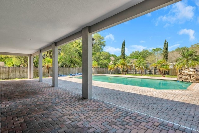 view of pool featuring a patio