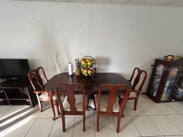 view of tiled dining space