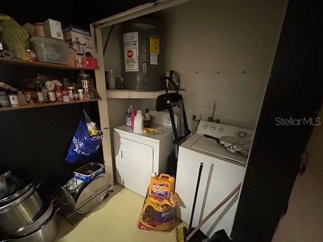 laundry room featuring washer and clothes dryer