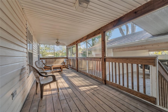 wooden terrace with ceiling fan