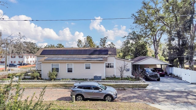 view of front of house featuring a carport