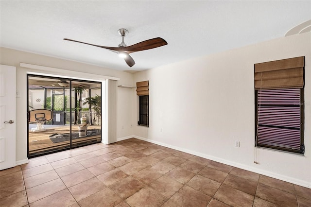 unfurnished room with ceiling fan