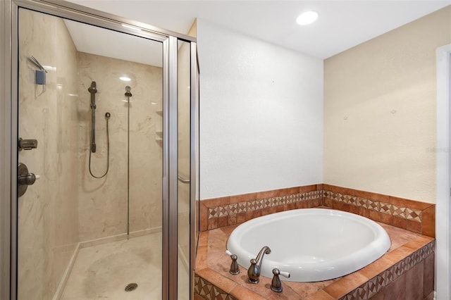 bathroom with independent shower and bath