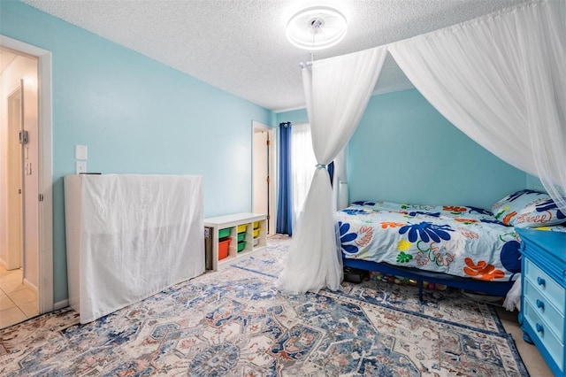 bedroom with a textured ceiling