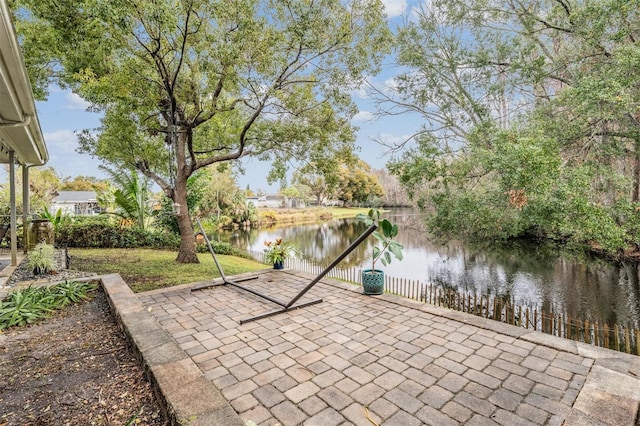 view of patio / terrace featuring a water view