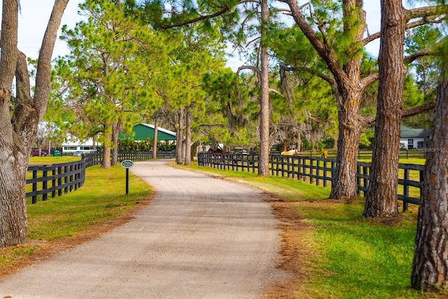 surrounding community featuring a lawn