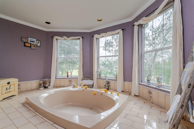 bathroom featuring tile patterned flooring, tiled tub, and ornamental molding