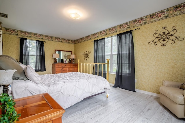 bedroom featuring hardwood / wood-style flooring