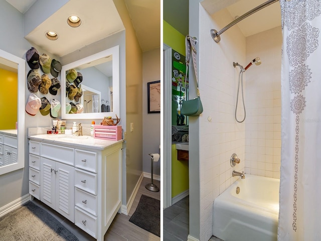 bathroom with shower / tub combo and vanity