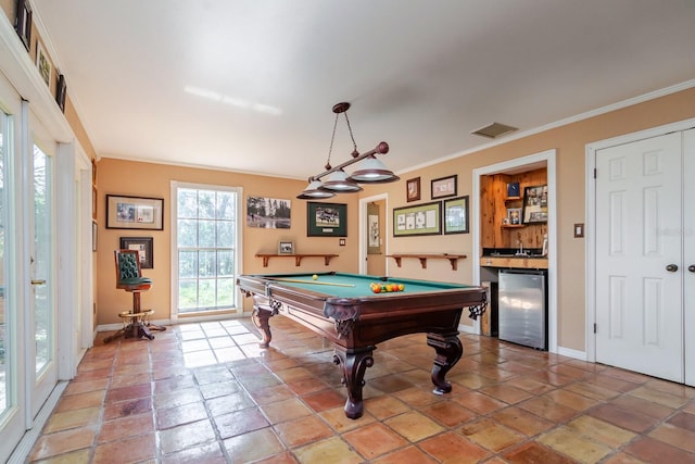 recreation room with pool table and ornamental molding