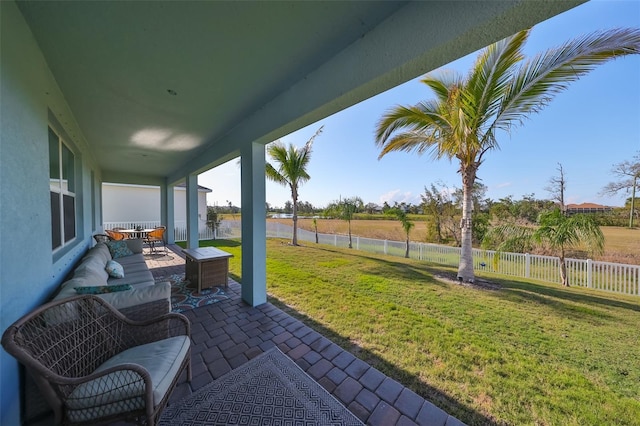 view of patio with a rural view and an outdoor living space