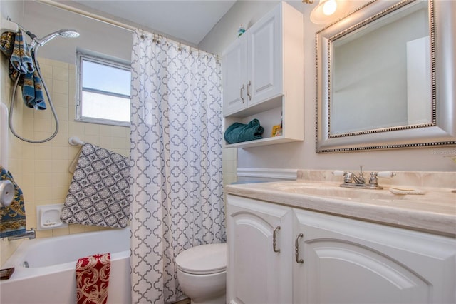 full bathroom with vanity, toilet, and shower / bath combo