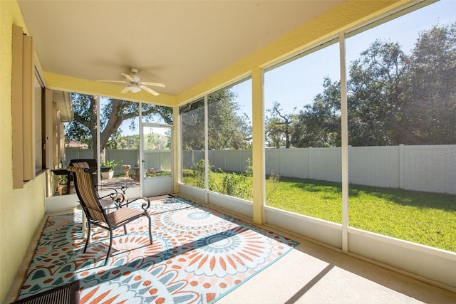 sunroom / solarium with ceiling fan