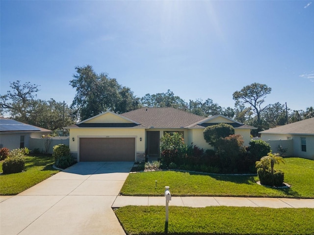 ranch-style house with a garage and a front yard