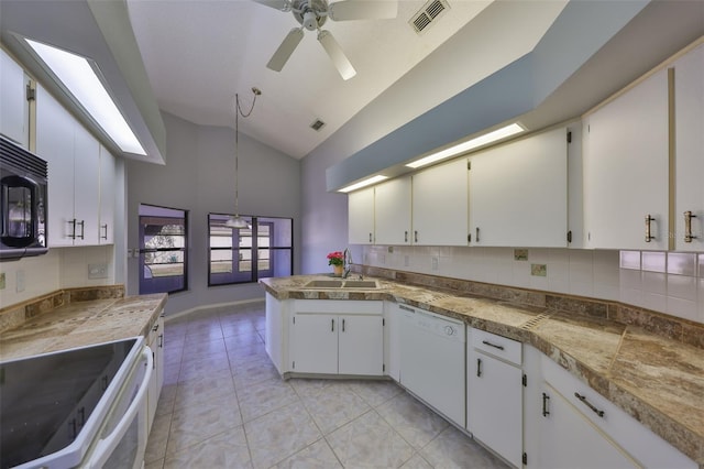 kitchen with white cabinets, electric range, sink, and dishwasher