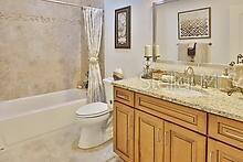 full bathroom featuring vanity, toilet, and shower / bath combo with shower curtain