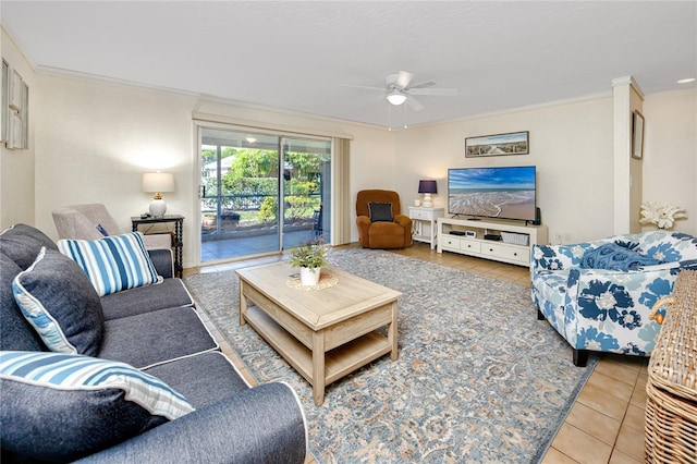 tiled living room with crown molding and ceiling fan