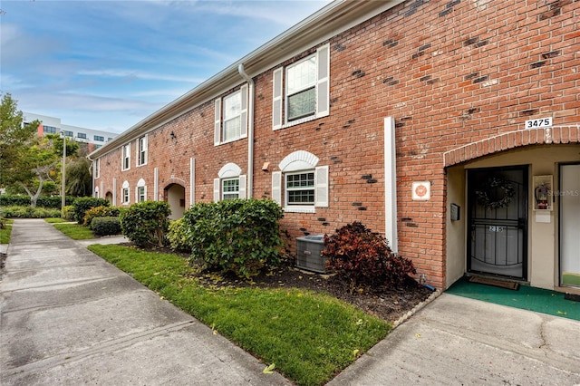 view of front of house featuring central AC unit