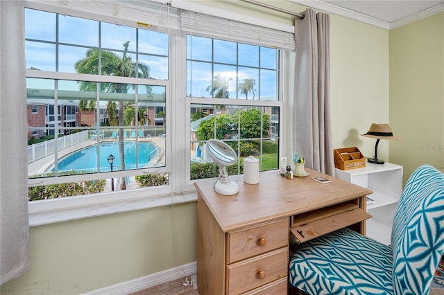 home office with crown molding