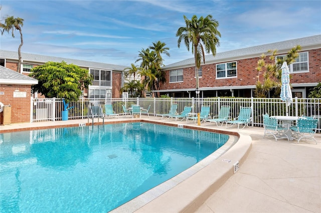 view of pool featuring a patio area