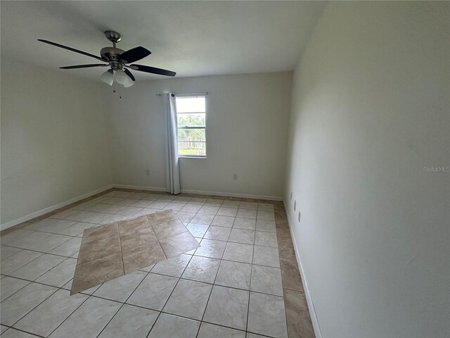 183 Bamboo Dr Unit B, Port Charlotte, FL 33954 - spare room with light tile patterned flooring and ceiling fan