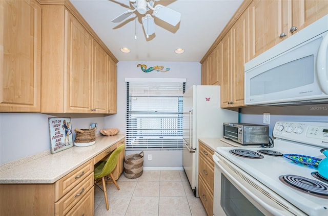 kitchen featuring light tile patterned floors, white appliances, ceiling fan, and light brown cabinets