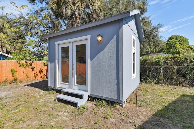 view of outdoor structure with a lawn