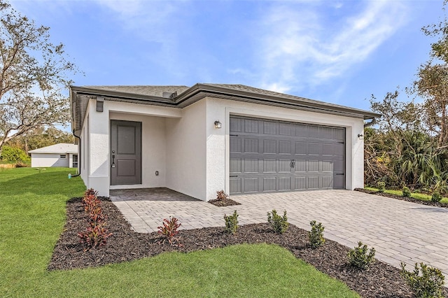 3418 Eagle Pass St, North Port, FL 34286 - ranch-style home with a front lawn, driveway, stucco siding, and an attached garage