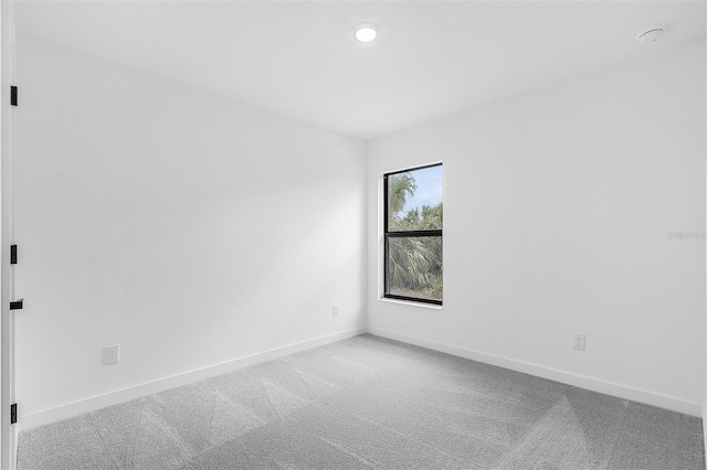 3418 Eagle Pass St, North Port, FL 34286 - empty room featuring carpet and baseboards