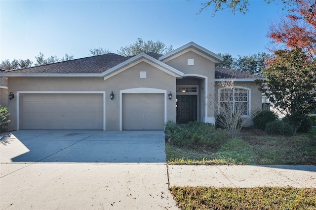 ranch-style home featuring a garage