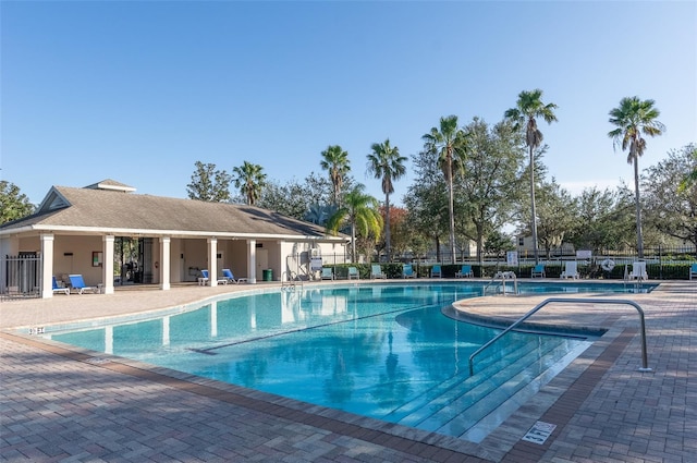 view of swimming pool featuring a patio area