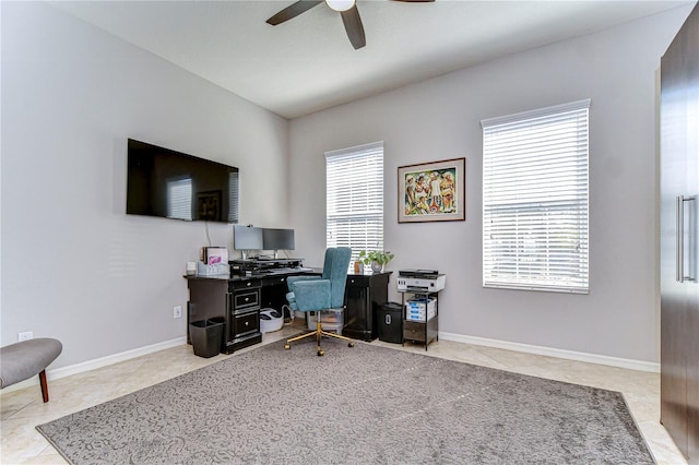 tiled office space with ceiling fan