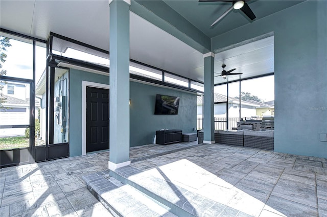 view of patio with french doors and ceiling fan