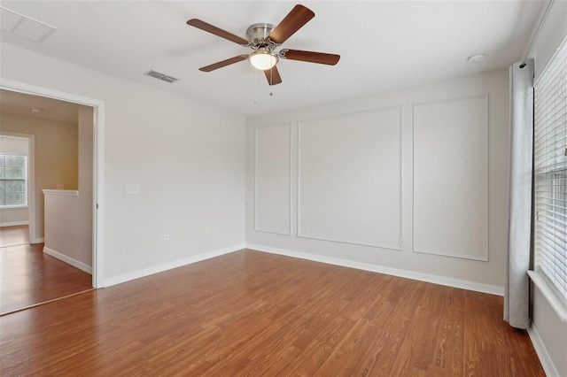 unfurnished room featuring wood-type flooring and ceiling fan