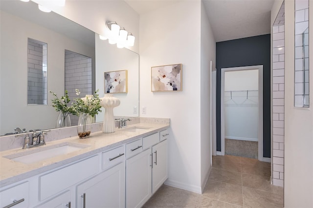 bathroom with vanity and tile patterned floors