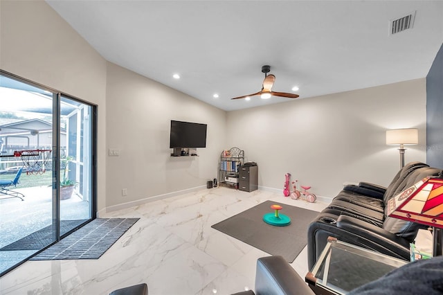 living room featuring lofted ceiling and ceiling fan