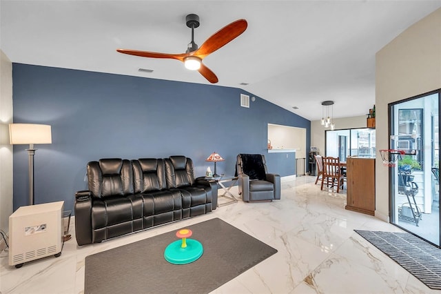 living area with lofted ceiling, marble finish floor, visible vents, and a ceiling fan