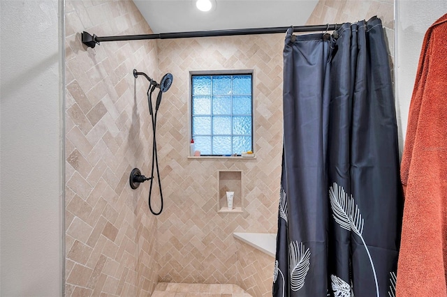 full bathroom with tiled shower and recessed lighting