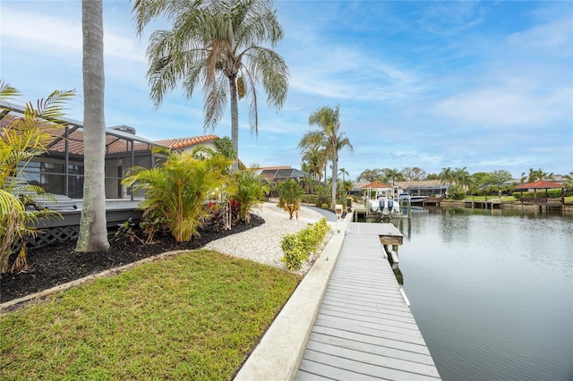 5809 Cruiser Way, Tampa, FL 33615 - dock with a water view, a lanai, and a yard