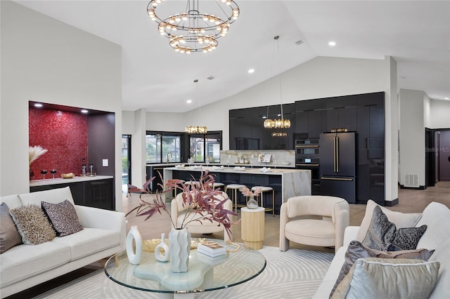 5809 Cruiser Way, Tampa, FL 33615 - living area featuring a chandelier, high vaulted ceiling, and recessed lighting