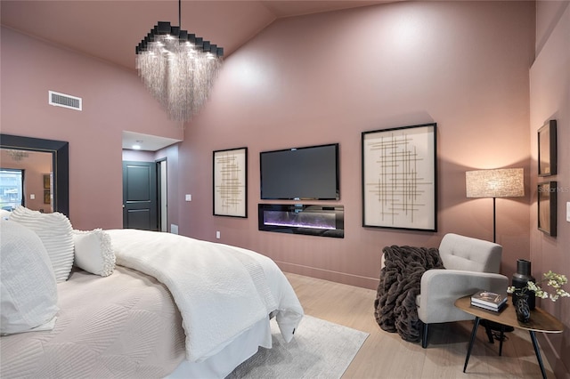 5809 Cruiser Way, Tampa, FL 33615 - bedroom with high vaulted ceiling and wood finished floors