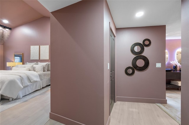 5809 Cruiser Way, Tampa, FL 33615 - hall with light wood-type flooring and baseboards